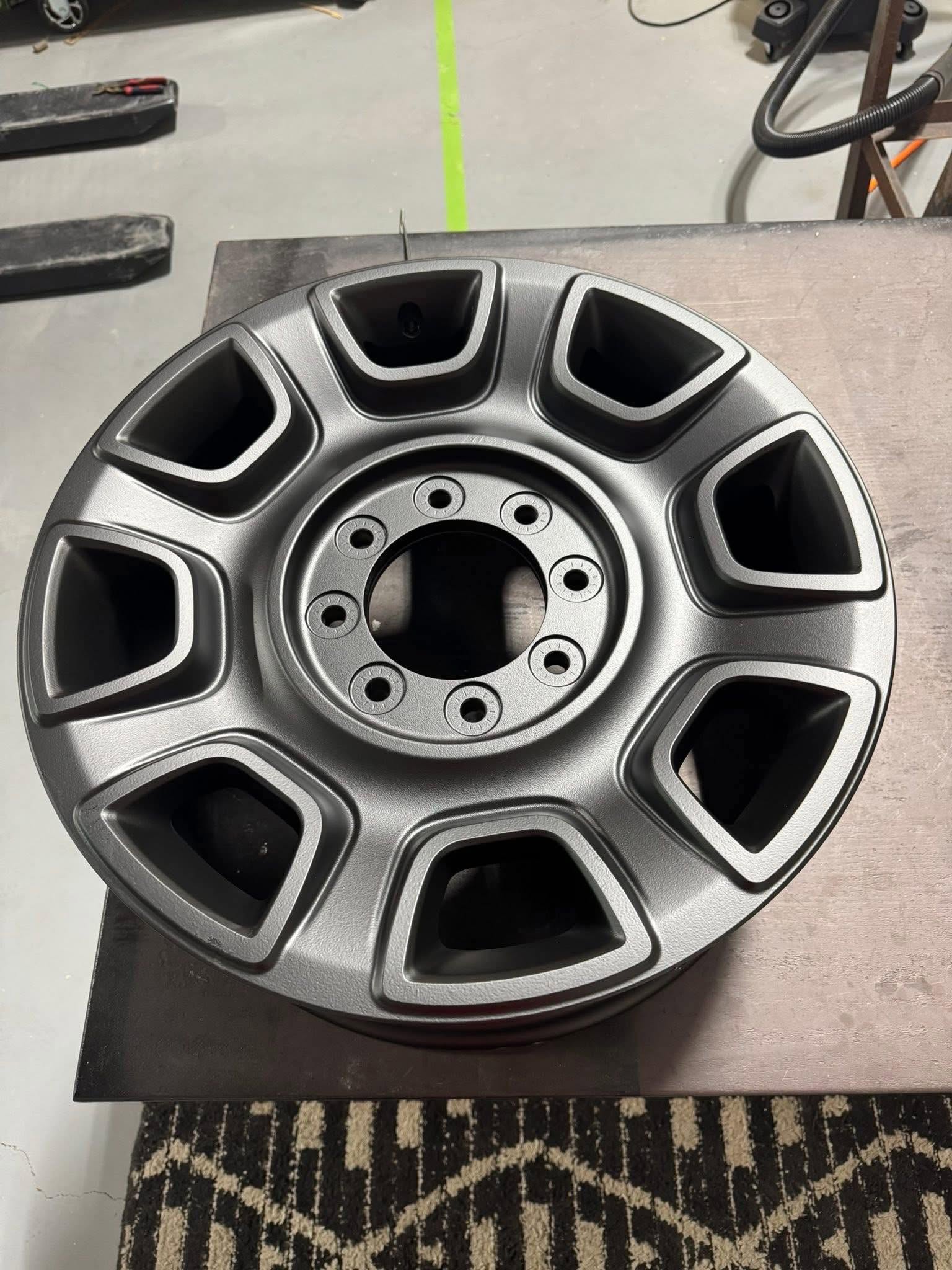 Matte gunmetal powder-coated truck wheel